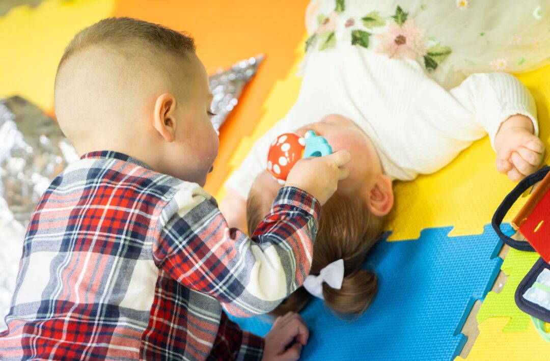 Siblings playing in hospital